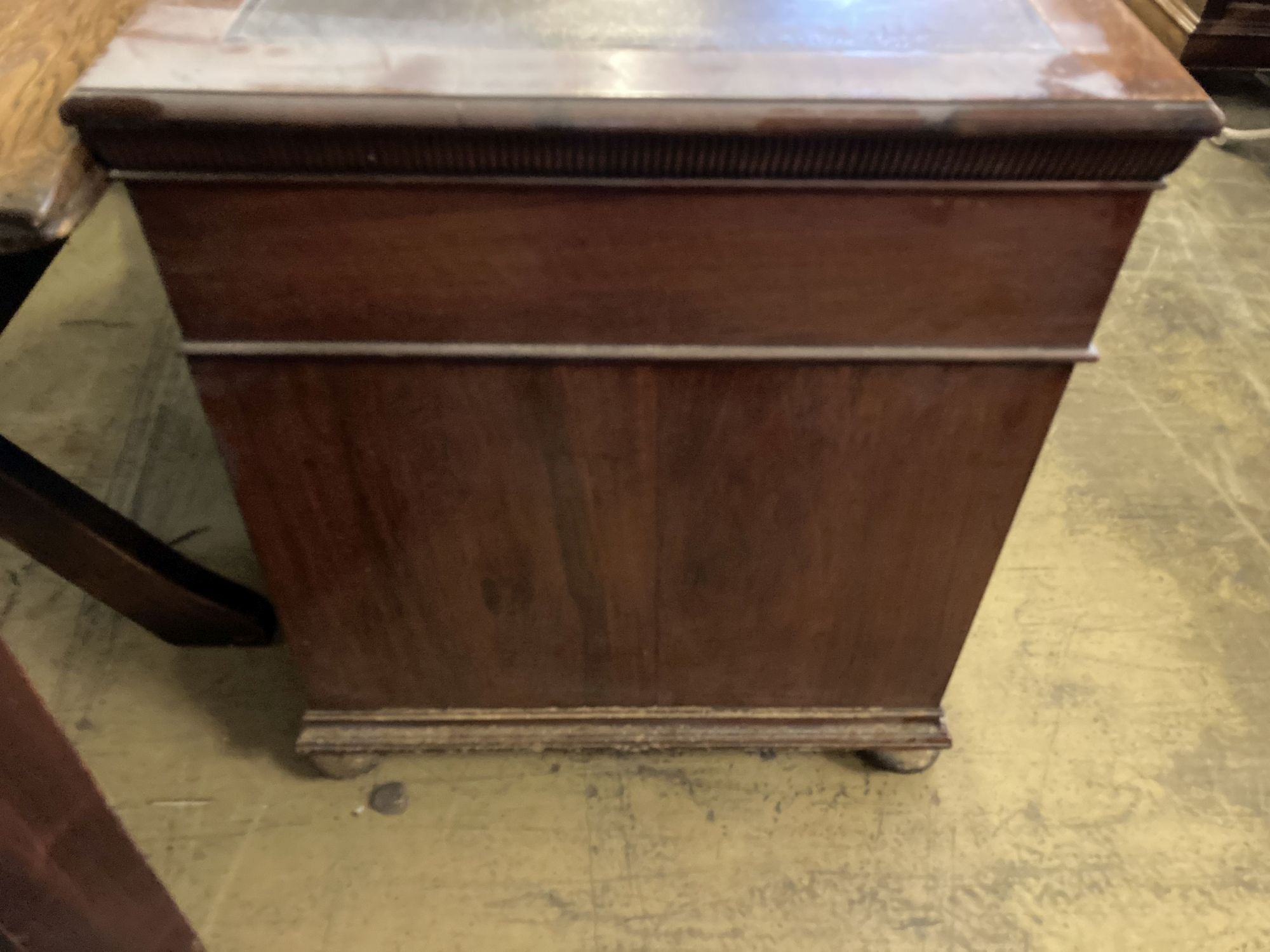 A late Victorian walnut pedestal desk, length 122cm, depth 67cm, height 77cm